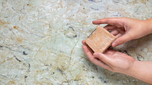 Caucasian person washing hands