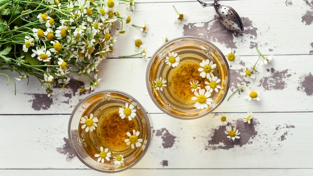 Free photo chamomile tea cups top view