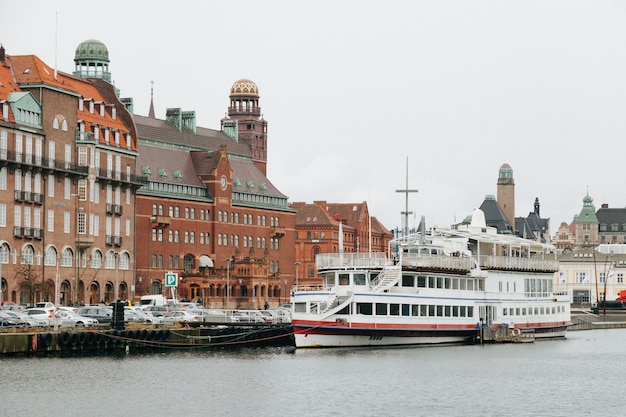 Free Photo channel of old city with ship sailing