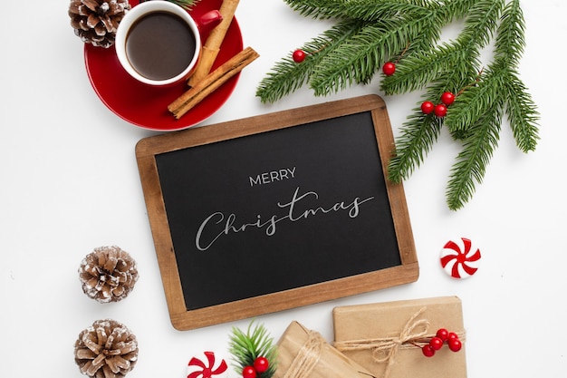 Free Photo christmas greeting on black board on a white background