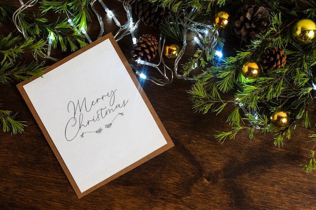 Free photo christmas lights with card mock-up