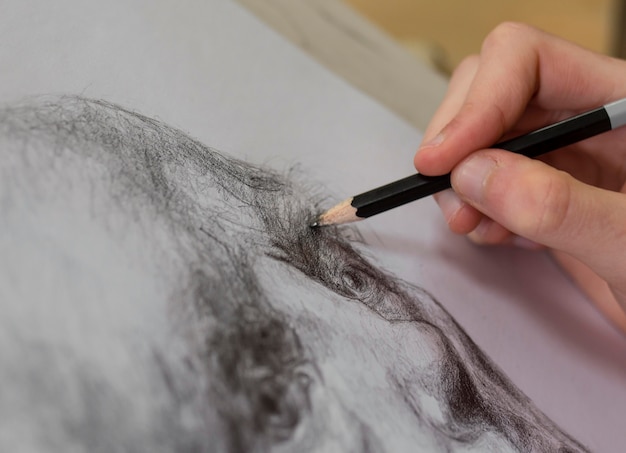 Free photo close up artist sketch