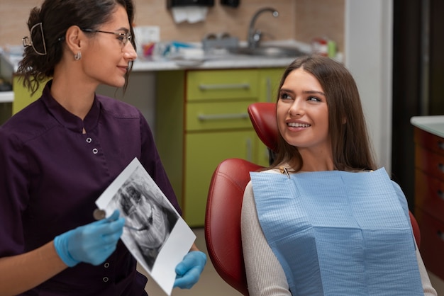 Close up on dentist using instruments