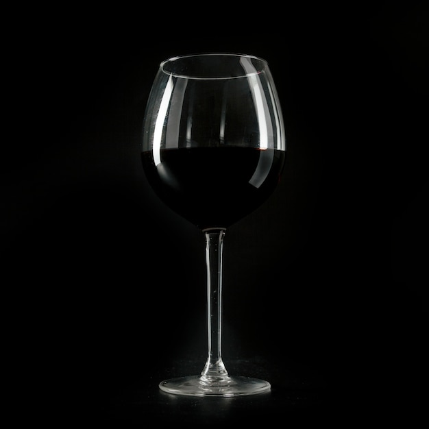 Free photo close-up glass with wine