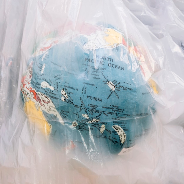 Free photo close-up of a globe inside transparent plastic bag