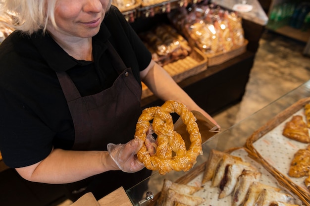 Close up on pastry chef preparing food