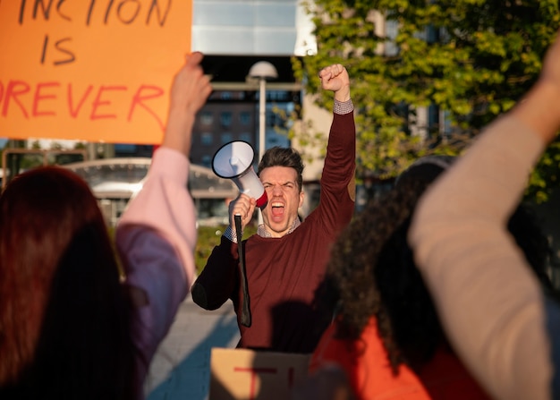 Free photo close up people protesting together