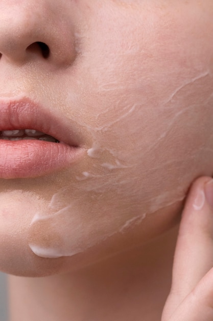 Free Photo close up portrait of woman with hydrated skin