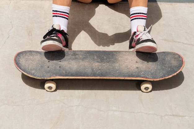 Close up skater with old board