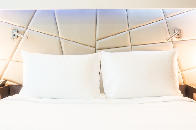 Free Photo close-up of two pillows with white covers