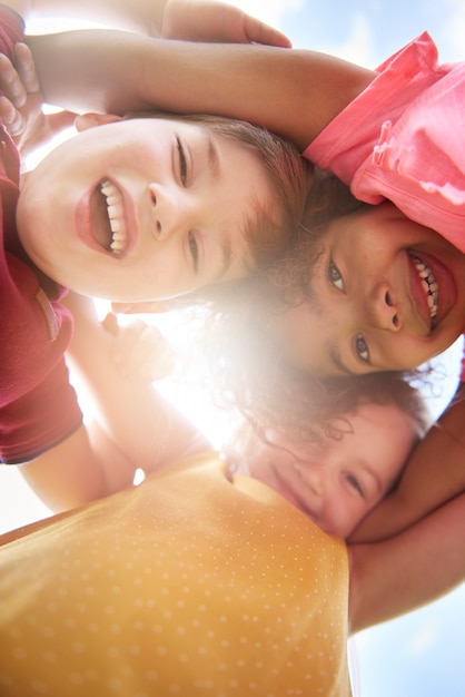 Free photo close up on young beautiful children having fun together