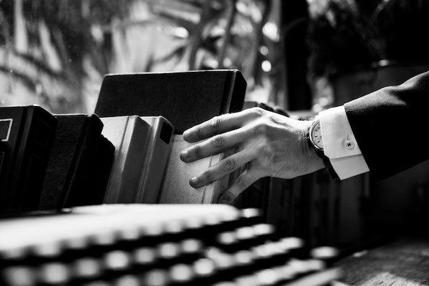 Free photo closeup of hand getting a book