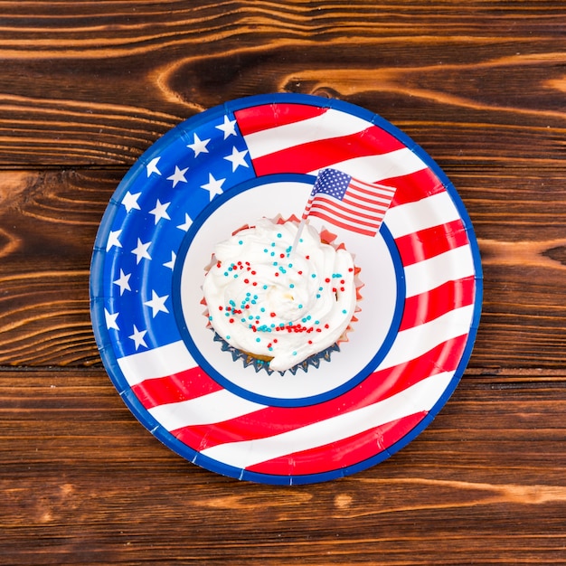 Free photo colorful cupcake with small usa flag