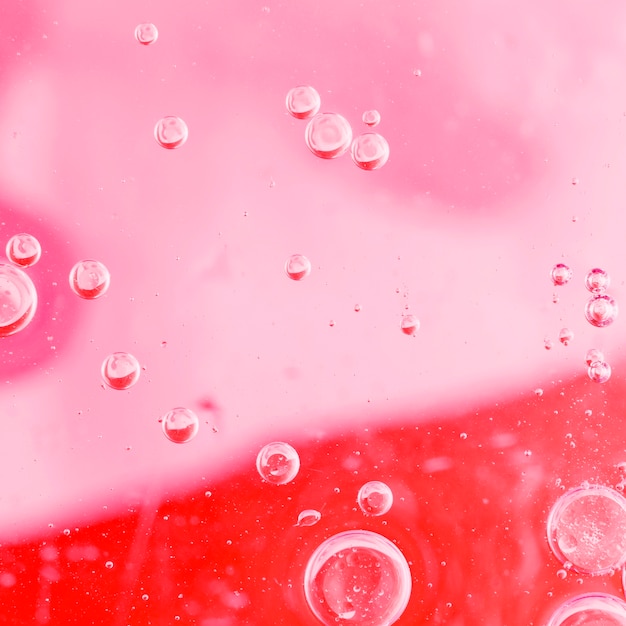 Free photo colorful red background with bubbles