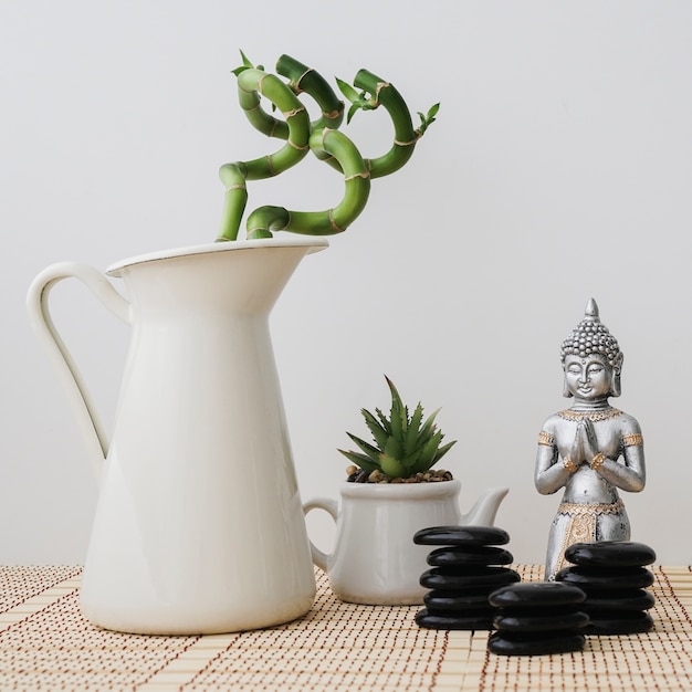 Composition with buddha, plants and stones