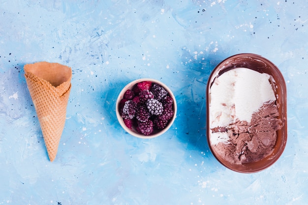 Free photo cone, berries and ice cream in row