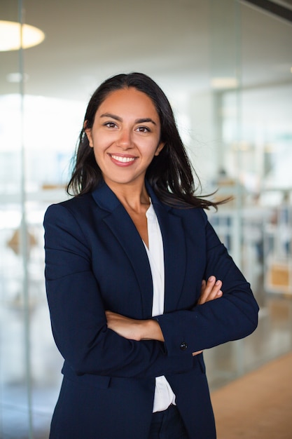 Confident cheerful young businesswoman