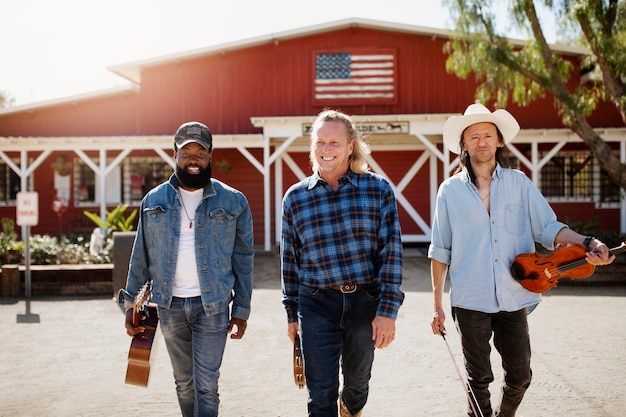 Free Photo country music band singing outdoors