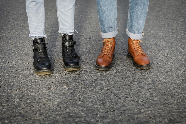 Free photo couple in boots on a road trip together