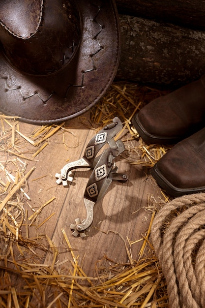 Free photo cowboy inspiration with hat and boots