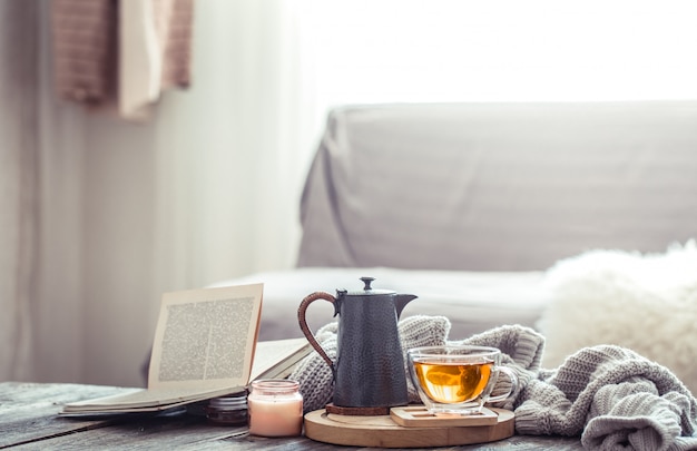 Free photo cozy autumn still life with a cup of tea