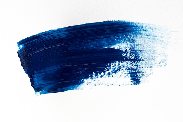 Free photo dark blue brush stroke on white background