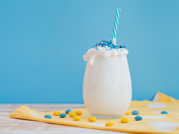 Delicious milkshake with sweets