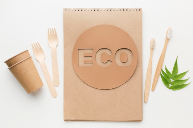 Free photo ecological notebook and toothbrush