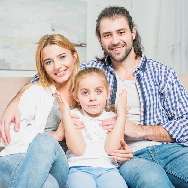 Free photo family portrait on the sofa