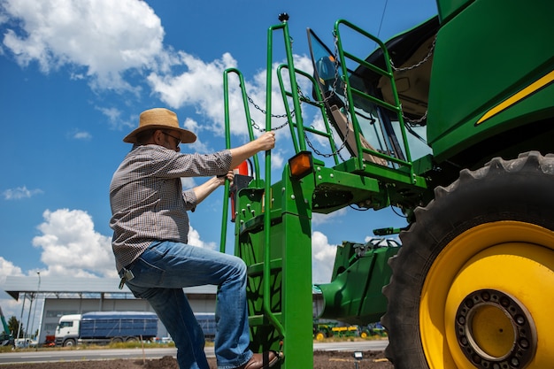 Free Photo a farmer with a tractor