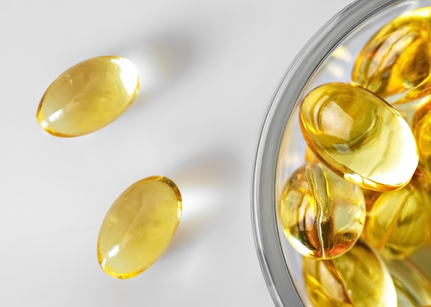 Free photo fish oil capsules in a glass bowl