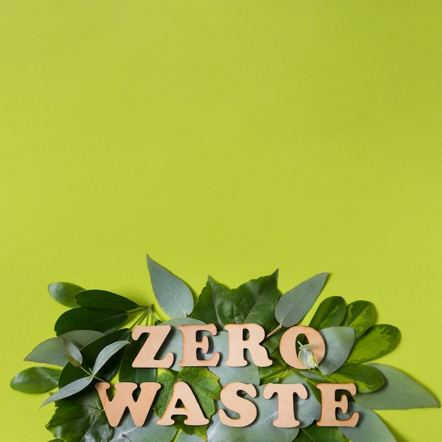 Free photo flat lay arrangement of zero waste lettering with copy space