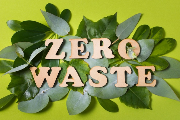 Free photo flat lay arrangement of zero waste lettering