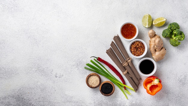 Free Photo flat lay mix of asian food ingredients with copy space