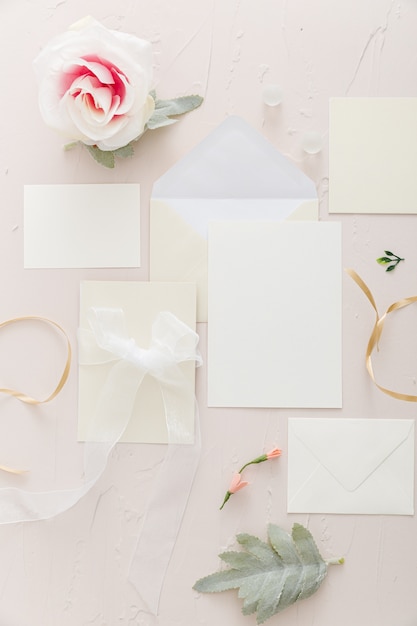 Free Photo flat lay of wedding invitation with copy space