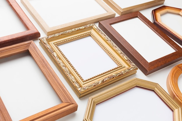 Free photo flat lay of wooden frames arrangement