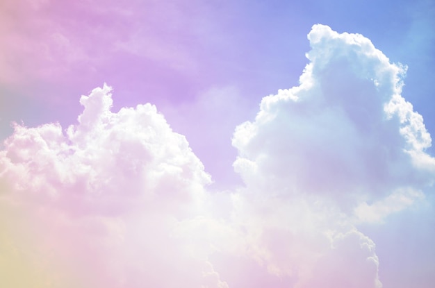 Free photo fluffy clouds on a pastel colorful background-perfect for wallpapers