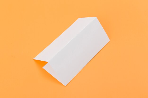 Folded rectangle brochure on desk