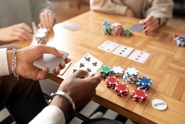 Free photo friends having fun while playing poker