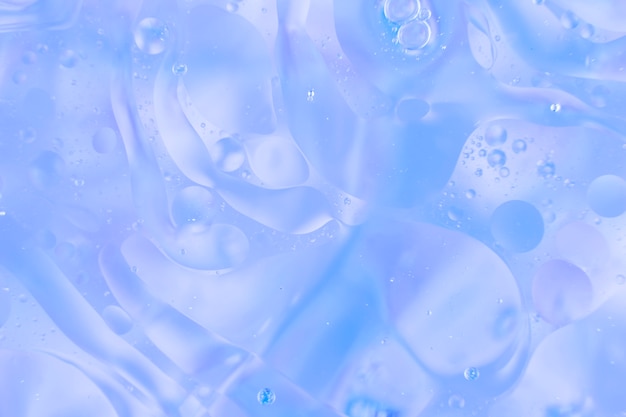 Free photo full frame of blue bubbles background