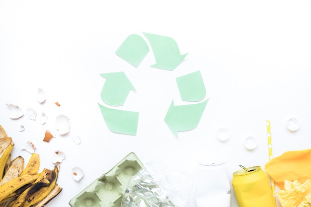 Free photo garbage layout with recycle logo