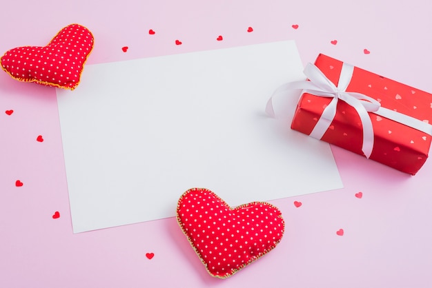 Free photo gift and handmade hearts around paper