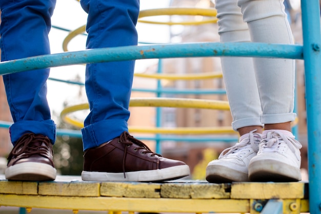 Free photo girl and boy feets closeup view