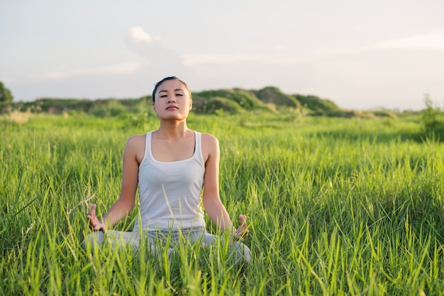 Free Photo girl sitting on the grass