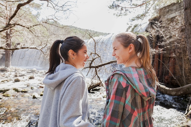 Free photo girls laughing together outdoors