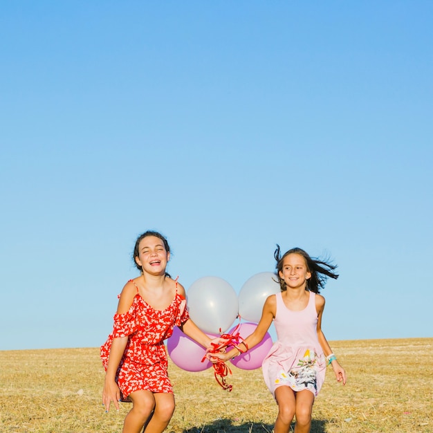 Free photo girls with balloons