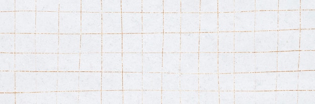 Gold distorted grid on white wallpaper