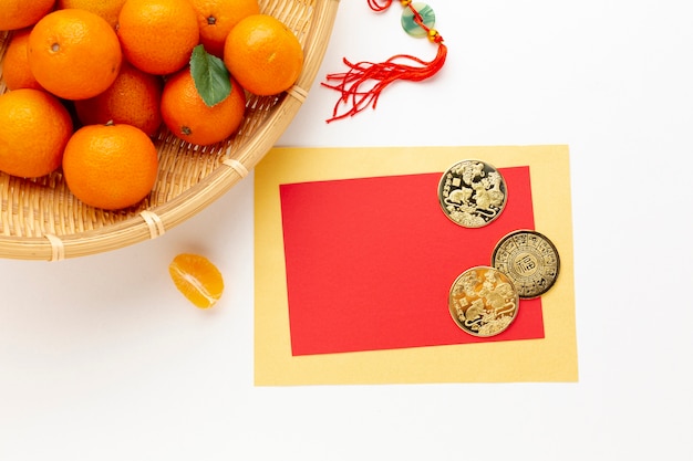 Free photo golden coins and card mock-up chinese new year