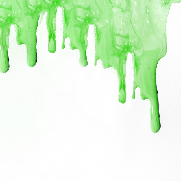 Free photo green liquid paint background with copyspace