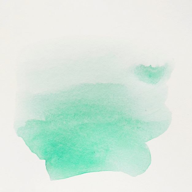 Free photo green water color brush stroke on white background